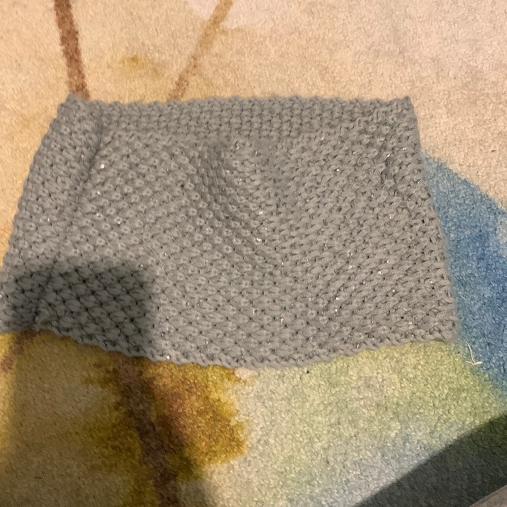 Simple grey scarf, knit, with small silver sparkles